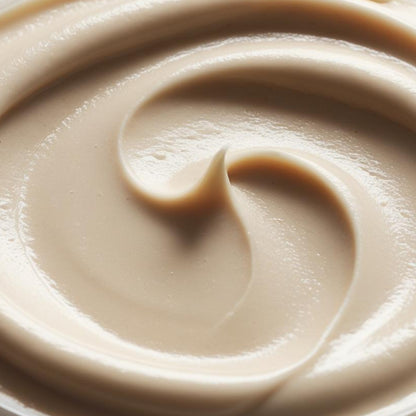 Close-up of Coffee Cream texture, light coffee-toned smooth swirl — PureButterMelts Bright Eyes Duo