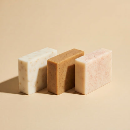 PureButterMelts Exfoliating Soap trio — Almond Oatmeal, Coffee Mint, and Salted Spa bars shown in Gentle, Medium, and Deep exfoliation levels