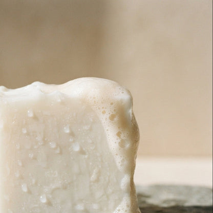 Goat's Milk Soap bar lathering into a creamy, gentle lather — moisturizing cleanser for dry and sensitive skin — PureButterMelts