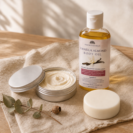 The Autumn Ritual bundle flat-lay — round Goat's Milk Soap bar, whipped Body Butter tin, and Body Oil bottle on natural linen a,  PureButterMelts