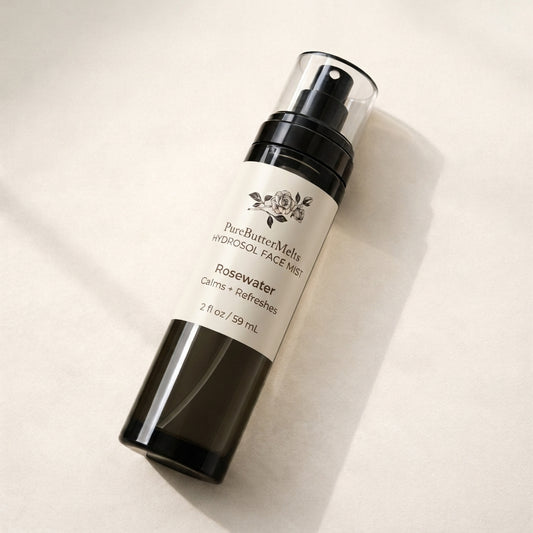 PureButterMelts Hydrosol Face Mist in Rosewater, a smoke-glass pump bottle of calming and refreshing facial toner, 2 fl oz