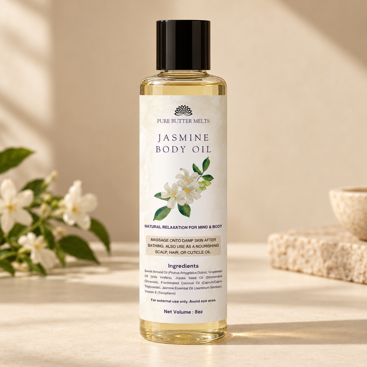 Pure Body Oil in Jasmine, an 8 oz clear glass bottle of botanical body oil — PureButterMelts