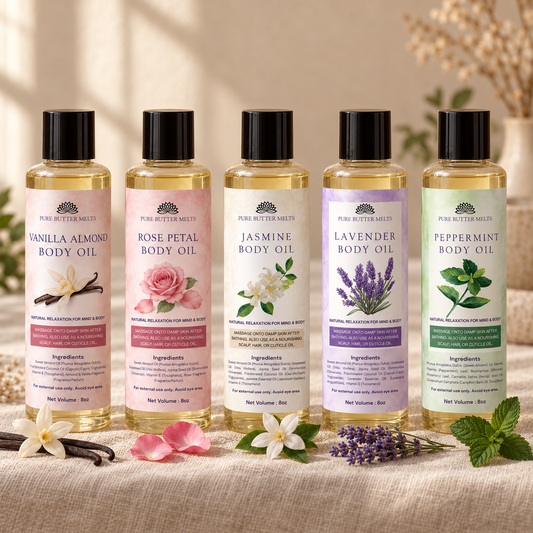All five Pure Body Oil blends lined up on textured beige linen with dried florals — Lavender, Vanilla Almond, Rose Petal, Jasmine and Peppermint — PureButterMelts